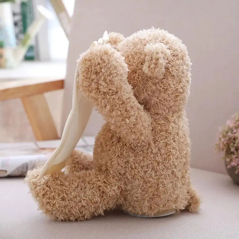Sjungande teddybjörn med peekaboo-funktion
